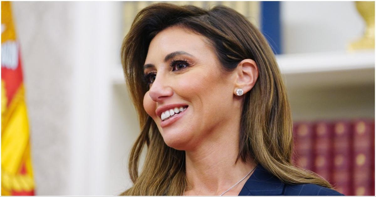 Alina Habba smiling while getting appointed