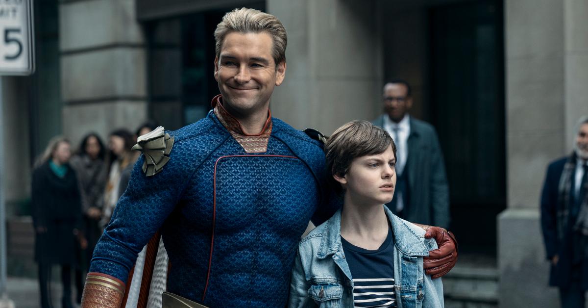 Homelander and his son, Ryan, stand in the street in Season 4 of 'The Boys.'