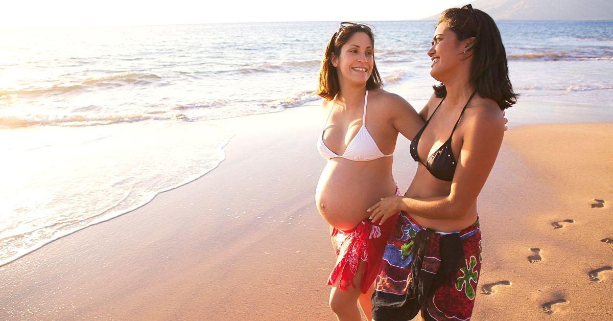 pregnant woman at the beach with friend