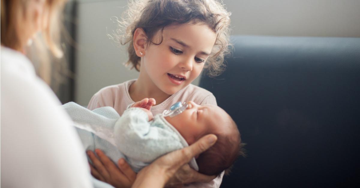 family visiting after a childbirth picture id