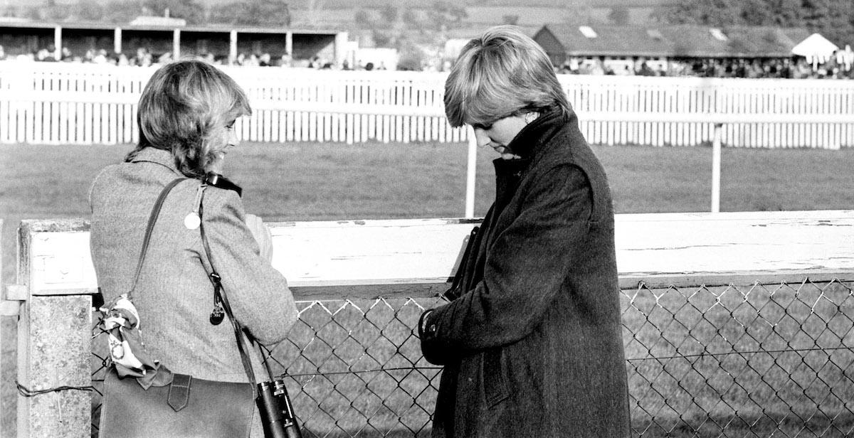 Camilla Parker-Bowles (left) and Lady Diana Spencer (later the Princess of Wales) at Ludlow racecourse to watch the Amateur Riders Handicap Steeplechase in which the Prince was competing