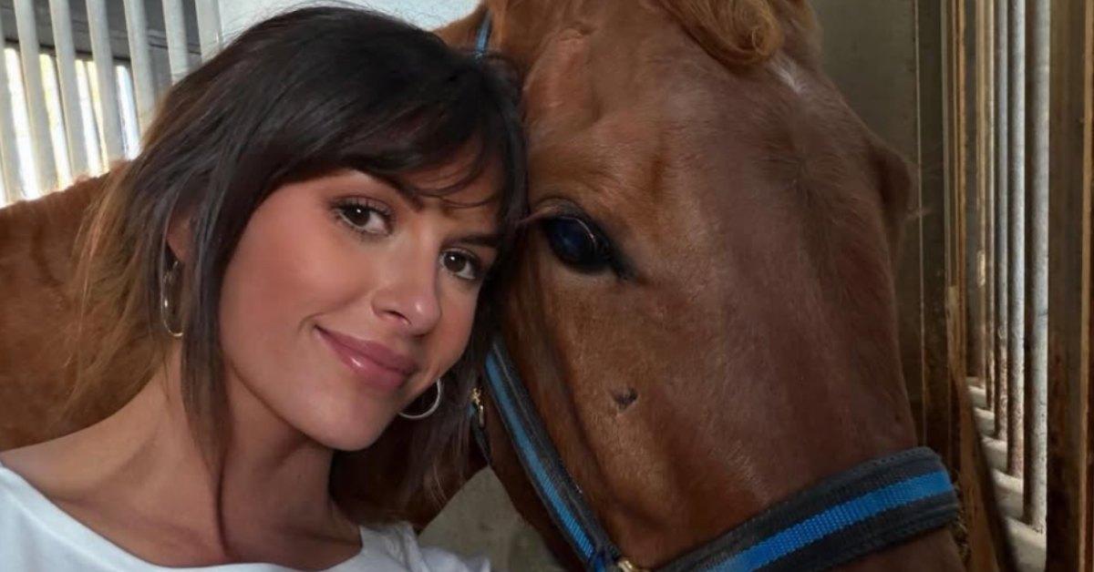 Ella Langley with a horse.