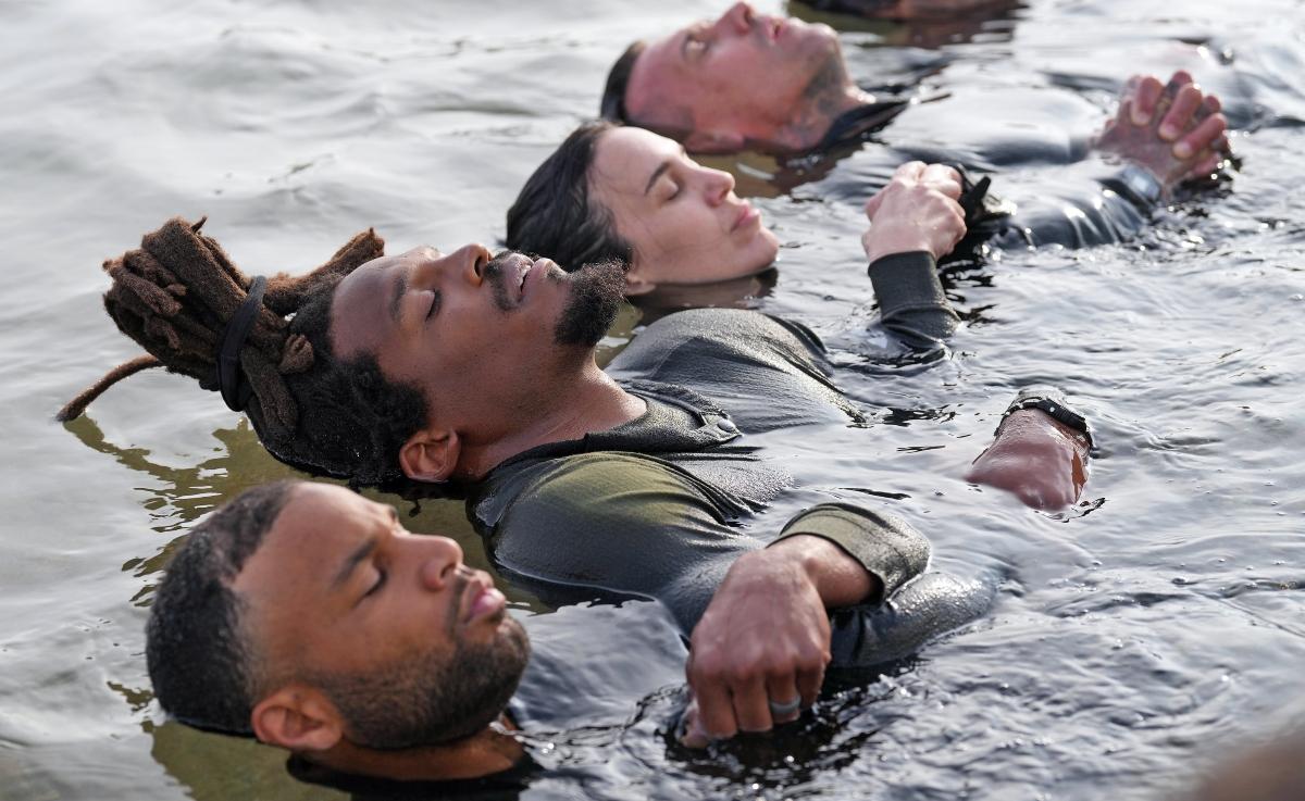 Some Special Forces cast members go through a test in water