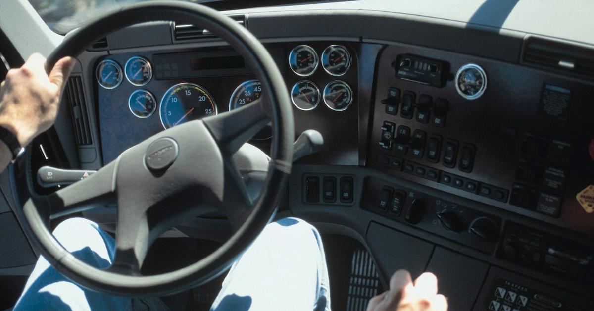 A person seated in a truck