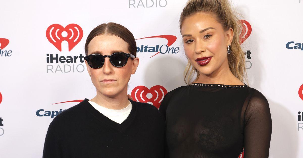 Robby Hoffman and Gabby Windey pose for a photo on the iHeart Radio red carpet