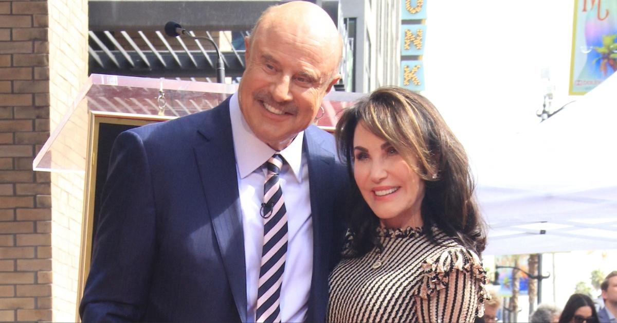 Dr. Phil McGraw poses with his wife, Robin, at his Hollywood Walk of Fame ceremony.