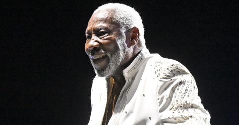 Eddie Levert in white performing in Stockbrigde, Ga.