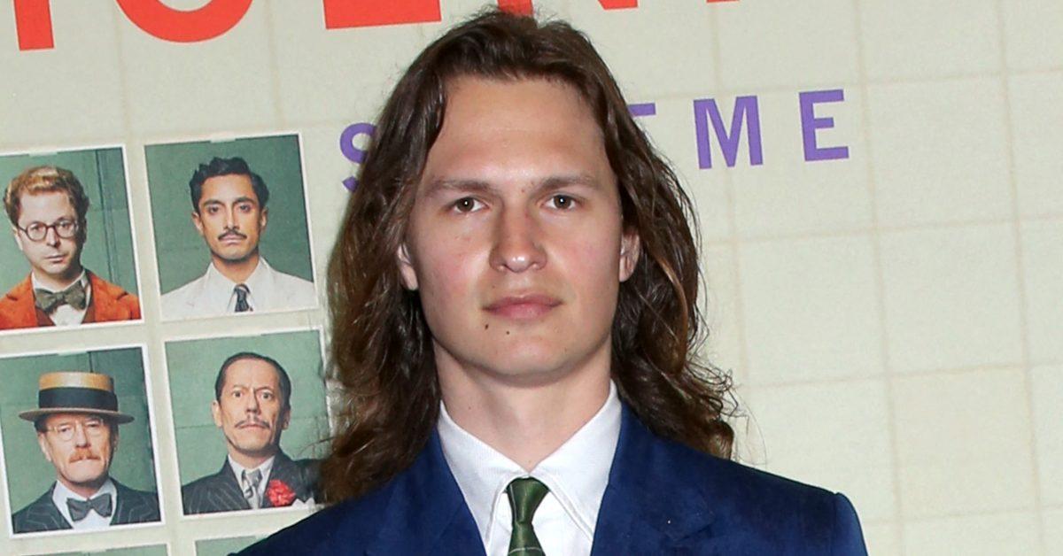 Ansel Elgort at a red carpet event.