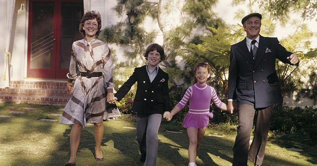 Gene Kelly with Jeanne Coyne and their children in the 1960s.