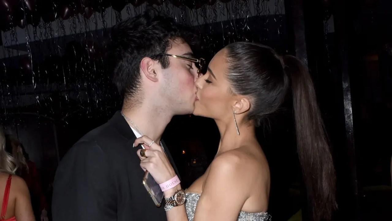 Zack Bia kissing Madison Beer at The Mod Sèlection Champagne New Years Party on Dec. 31, 2018