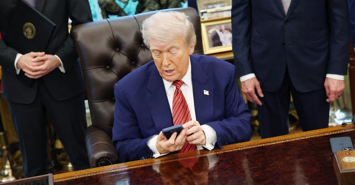 Donald Trump on a cell phone