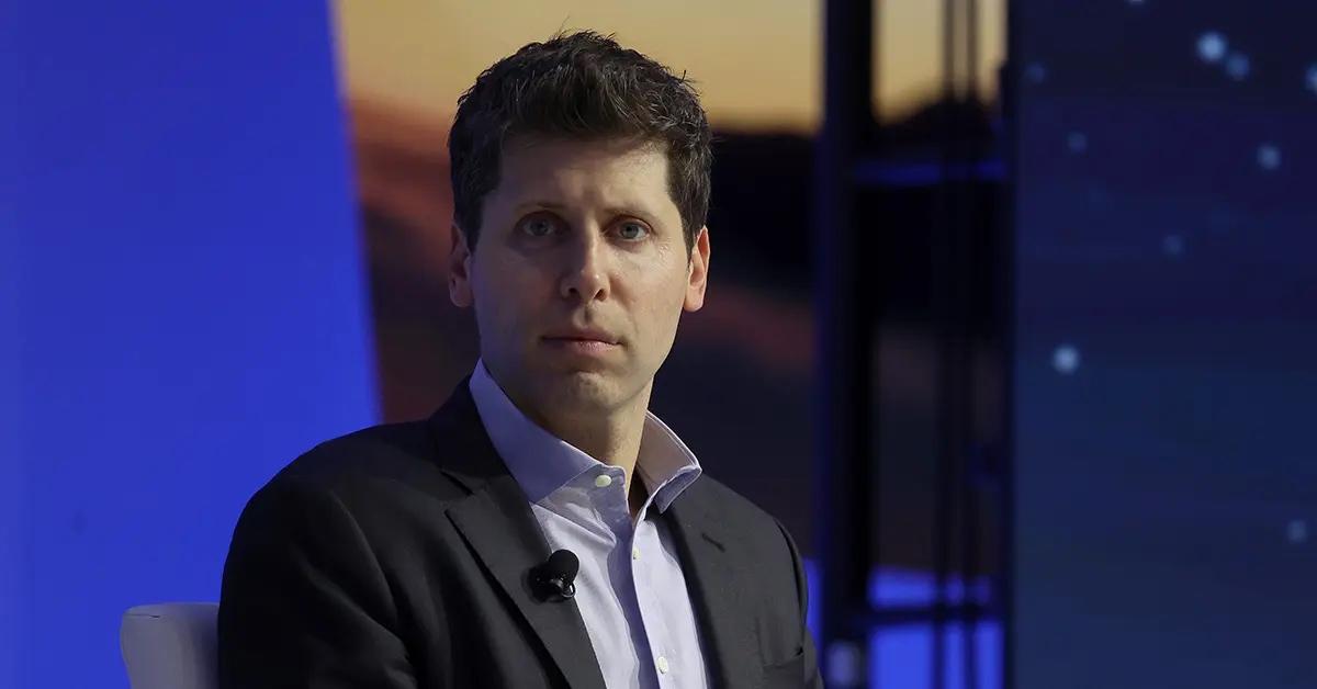 Sam Altman sitting on stage at the APEC CEO Summit. 