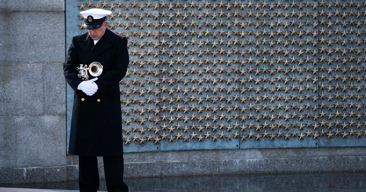 A soldier with a horn at the World War II memorial in Pearl Harbor. 