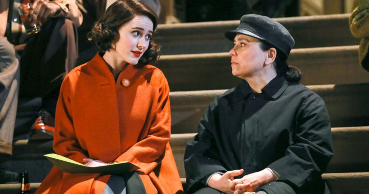 Midge and Susie discuss Midge's career on steps outside on 'The Marvelous Mrs. Maisel'