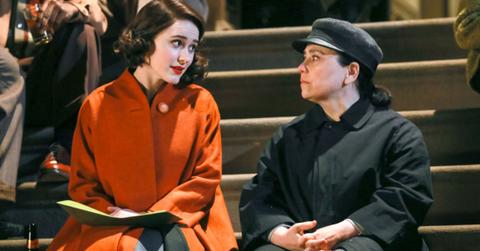 Midge and Susie discuss Midge's career on steps outside on 'The Marvelous Mrs. Maisel'
