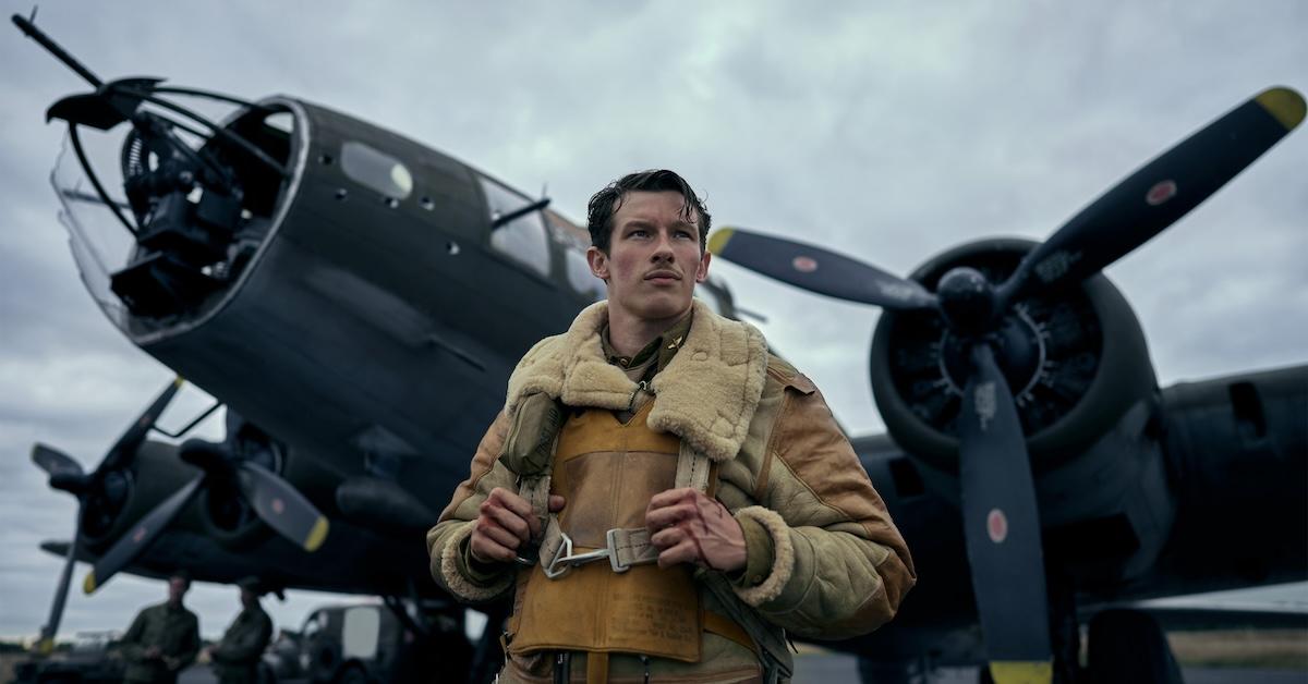 Callum Turner standing in front of a plane in 'Masters of the Air'