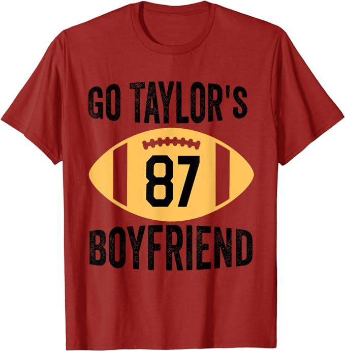 A red t-shirt that says "go taylor's boyfriend with the number 87 in a football