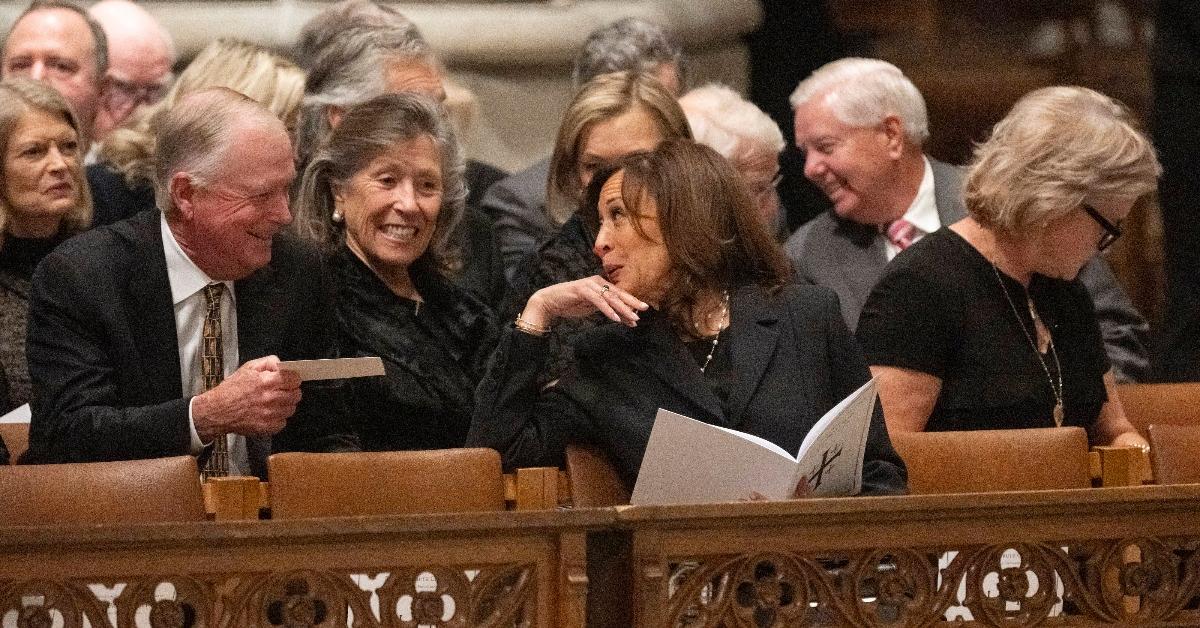 Former vice presidents Dan Quayle (L) and Kamala Harris (R) chat at Dick Cheney's funeral