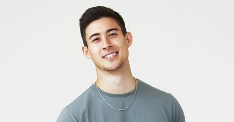 John Buresh smiling during his promotional photo for 'The Bachelorette'