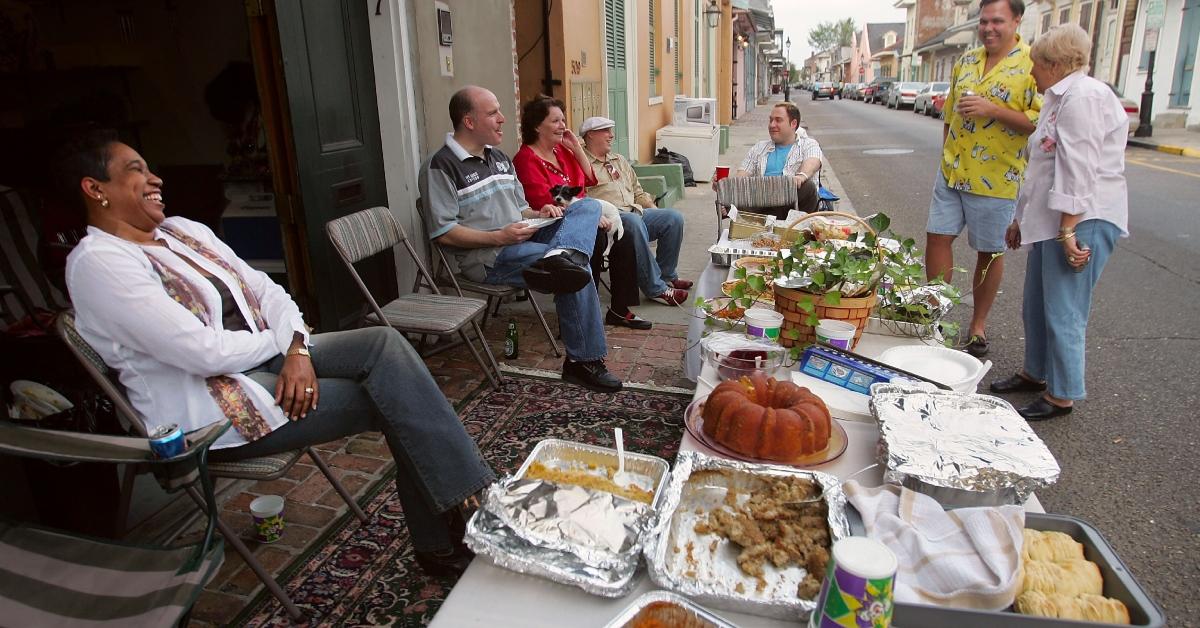 potluck thanksgiving dinner outside a home in the french quarter of new orleans