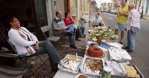 potluck thanksgiving dinner outside a home in the french quarter of new orleans