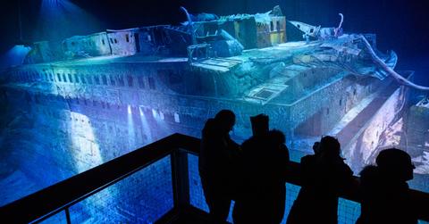 People looking at a panorama presentation of the Titanic shipwreck by artist Yadegar Asisi on Jan. 27, 2017, in Germany.