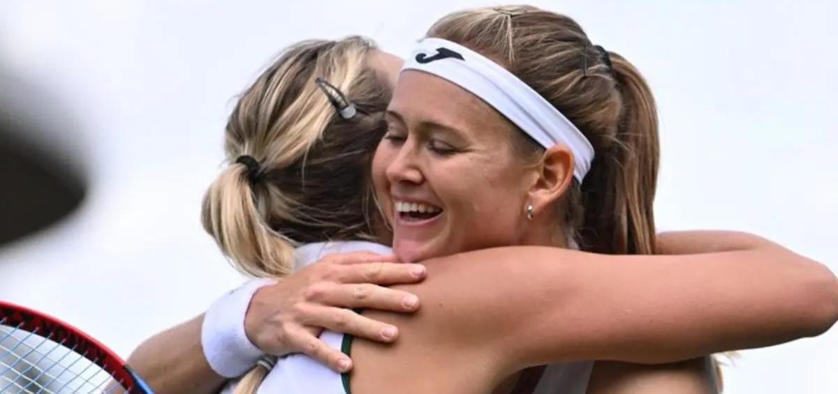 Anett Kontaveit hugging an oponent during her final match at 2023 Wimbledon in London.