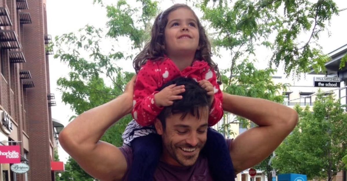 Ken McNickle with his daughter on his shoulders.