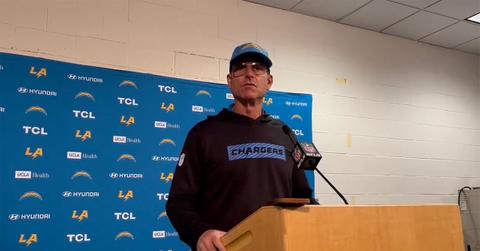 Jim Harbaugh at a press conference following his arrhythmia.