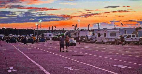 Atco Dragway at sunset with trailers in the foreground.