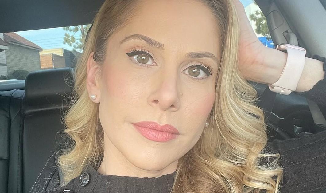 Ana Kasparian posing for a car selfie