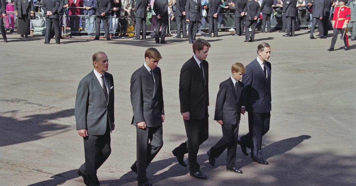 Prince Philip, Duke of Edinburgh, Prince William, Charles Spencer, 9th Earl Spencer, Prince Harry, and Prince Charles, Prince of Wales, walk behind the funeral cortege carrying the coffin of Diana to her funeral service at Westminster Abbey, London, England, Sept. 6, 1997