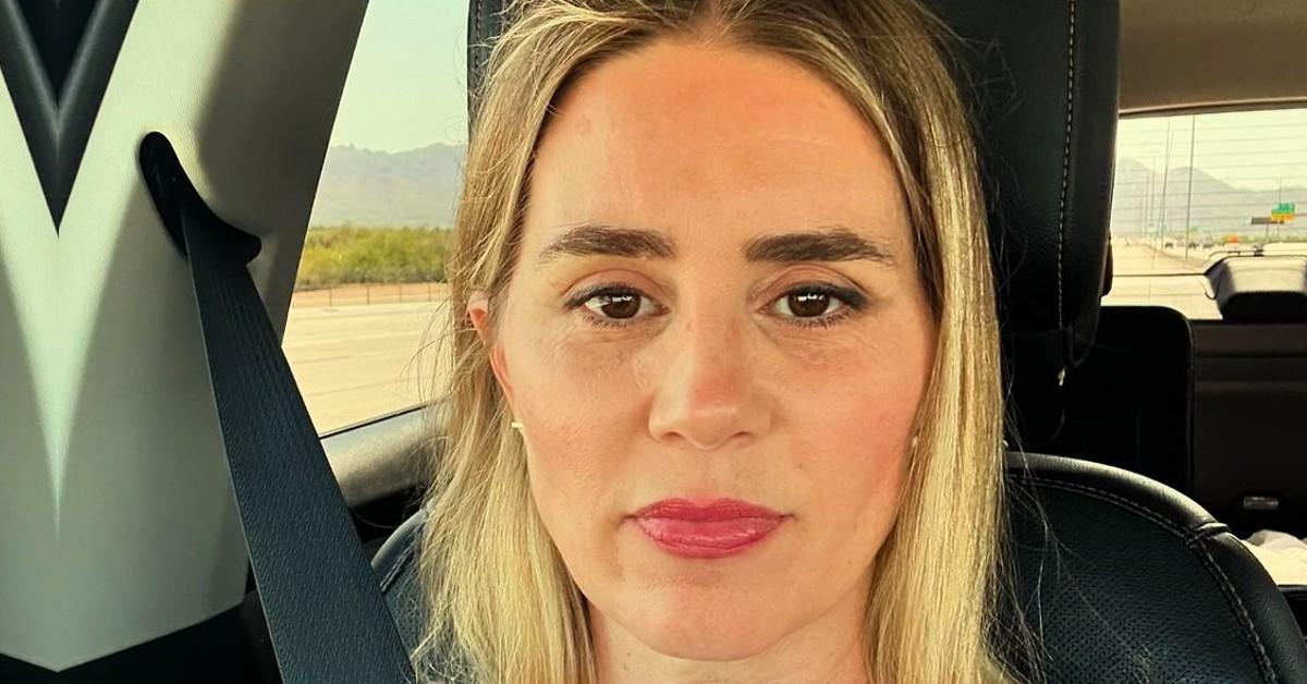 Alison Lohman with a straight face in a car selfie