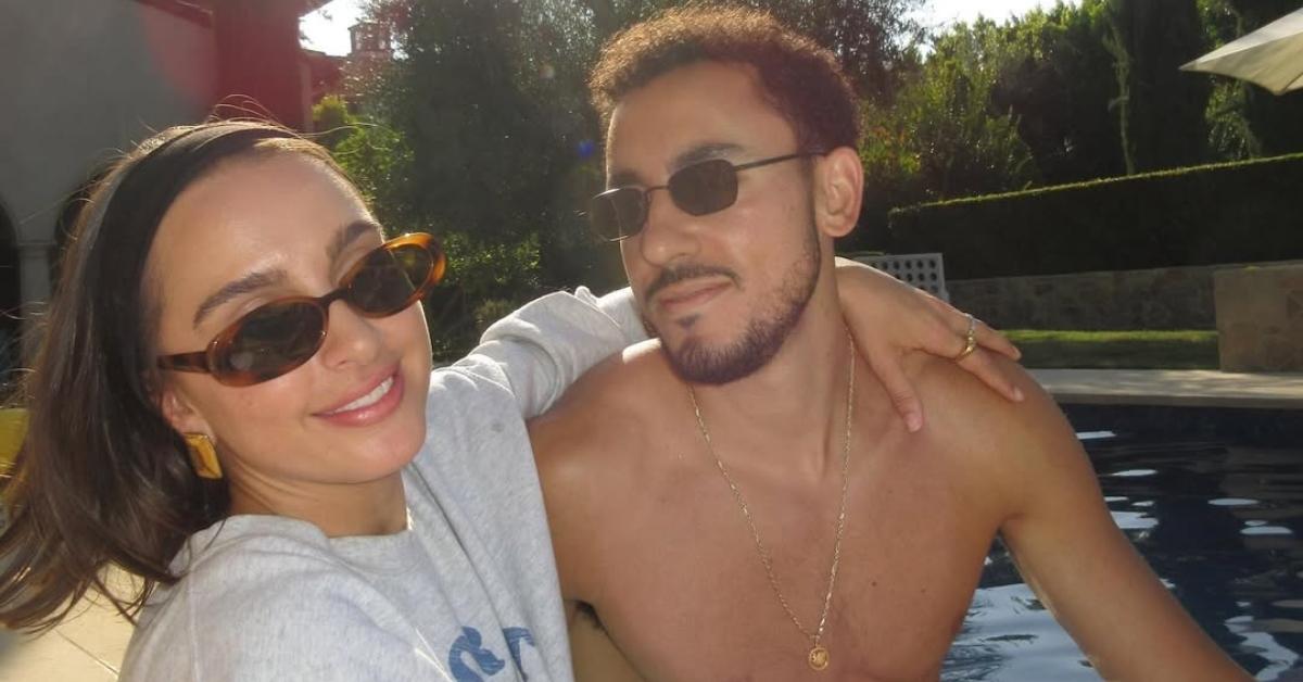Alexia Umansky poolside with her husband.