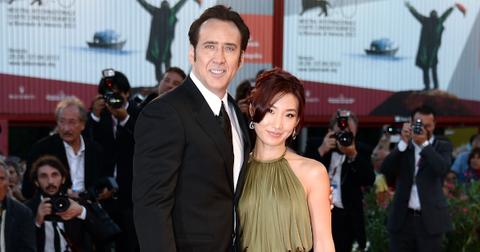 Actor Nicolas Cage and his wife Alice Kim attend an event.