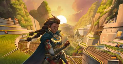 Illari standing in front of a setting sun.