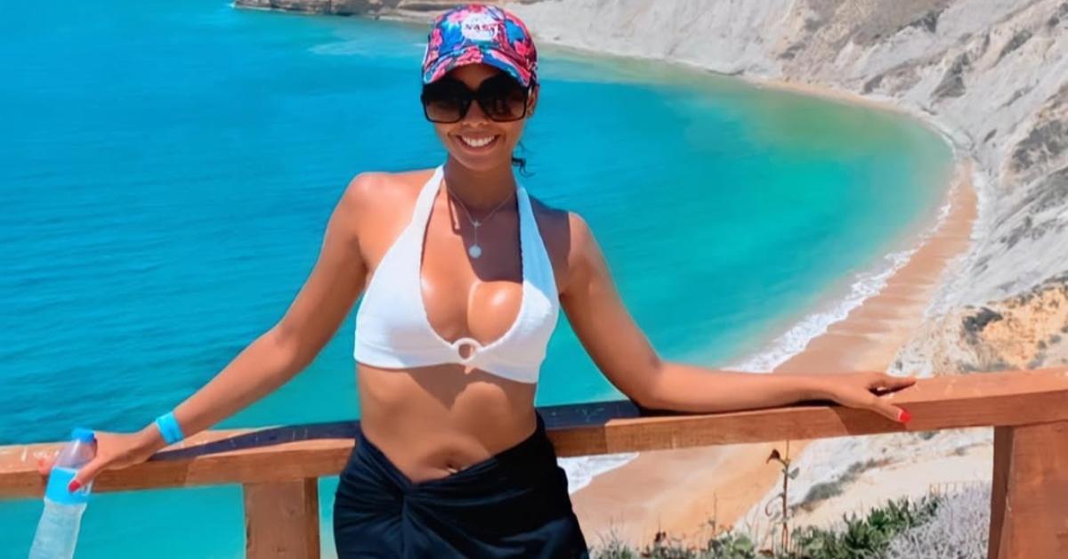 Nicole Jimeno in a bikini overlooking the ocean.