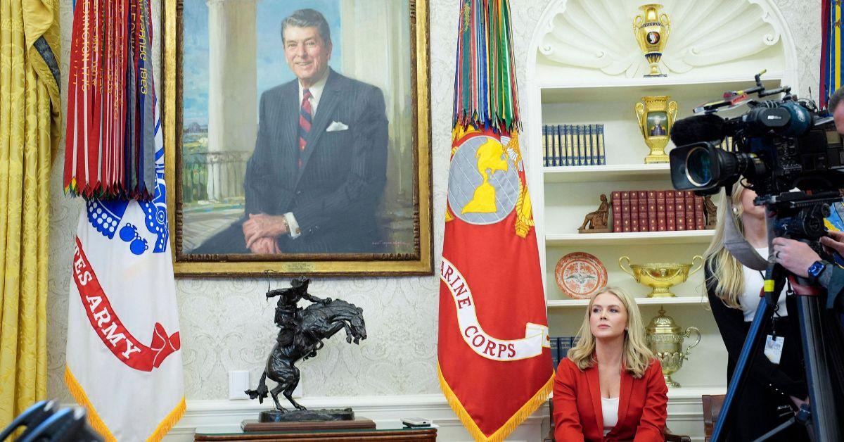 Karoline Leavitt sitting in the Oval Office. 