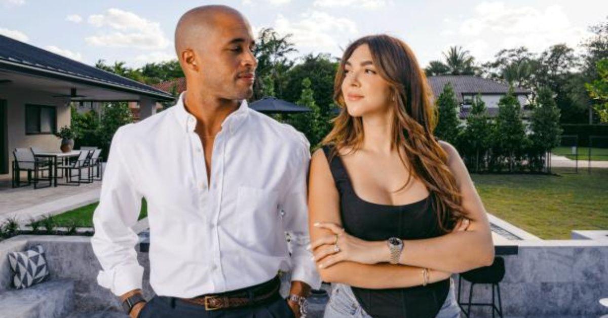 Ray and Eilyn Jimenez look at each other for 'Divide By Design' promo photo