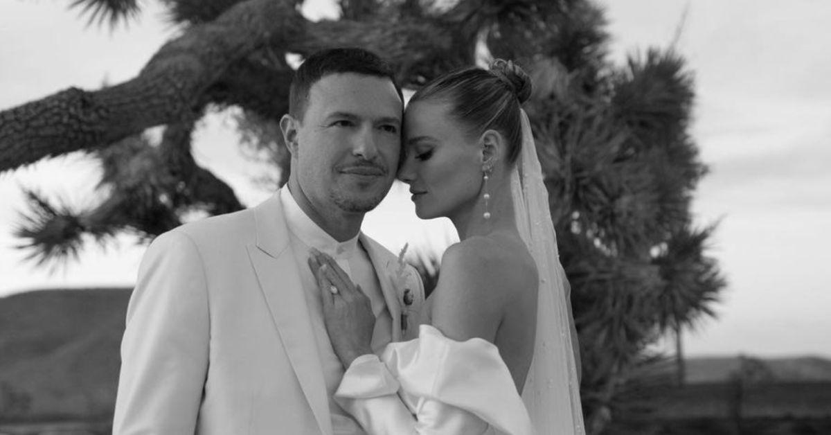 Adam Gold and Alanna Gold pose for a wedding photo