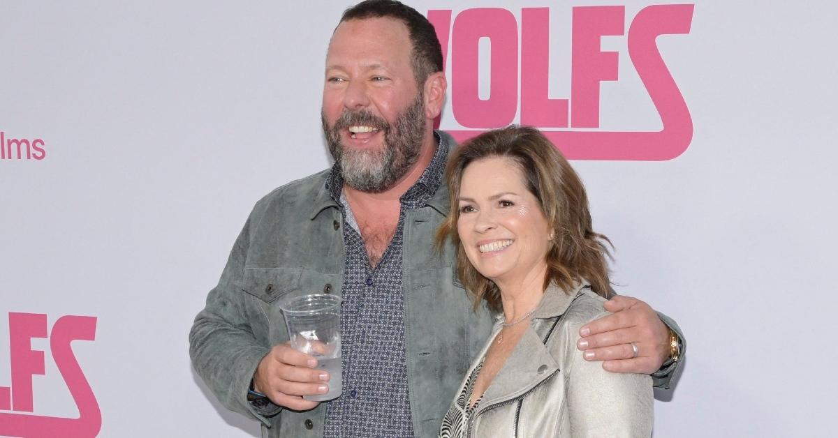 Bert Kreischer with his wife at a red carpet event.