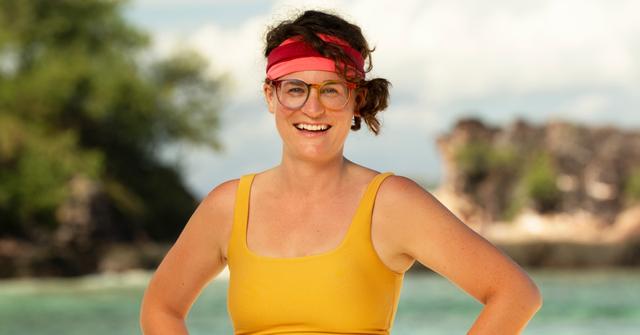 Liz Wilcox in a yellow tank top and headband.