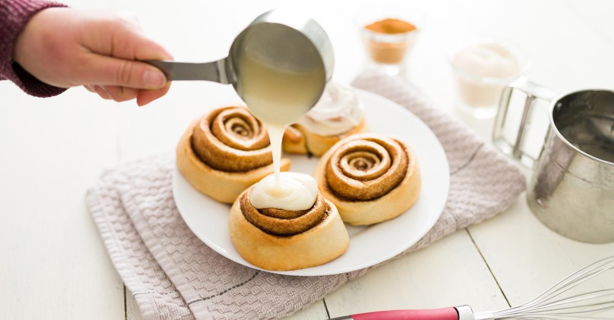 Baked sweet buns served on a plate to eat as dessert - stock photo