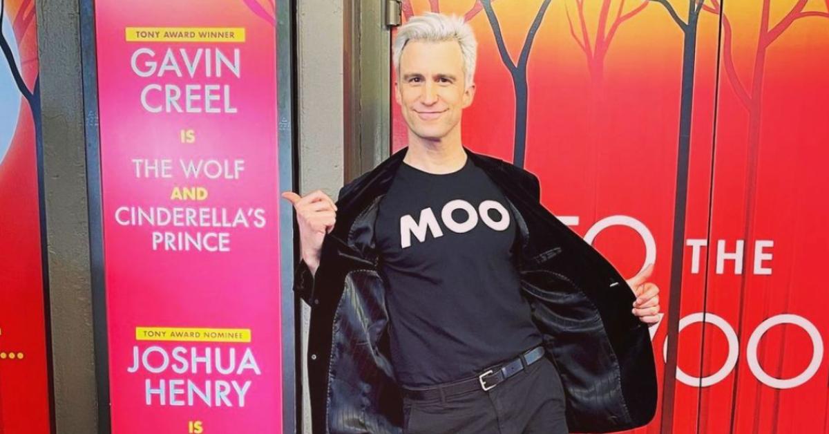 Gavin Creel poses in front of 'Into the Woods' on Broadway in August 2022.