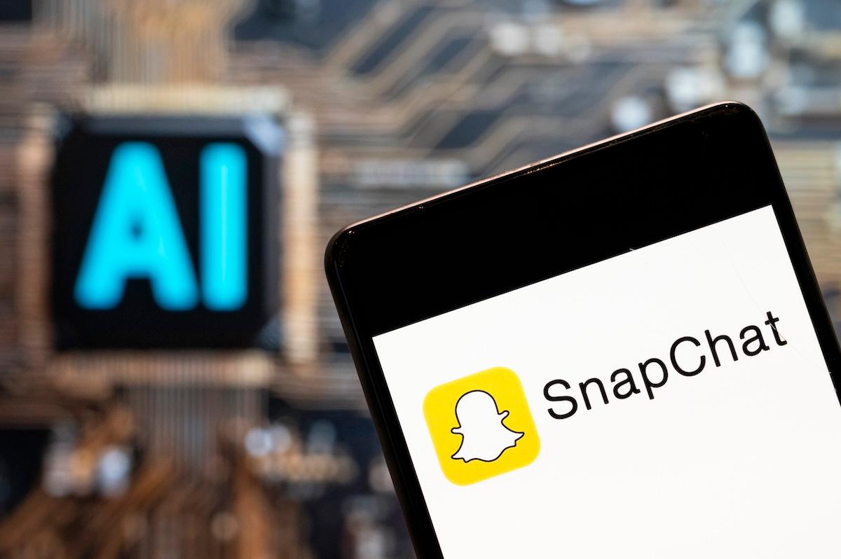 Snapchat on a smartphone with an "AI" sign in the background