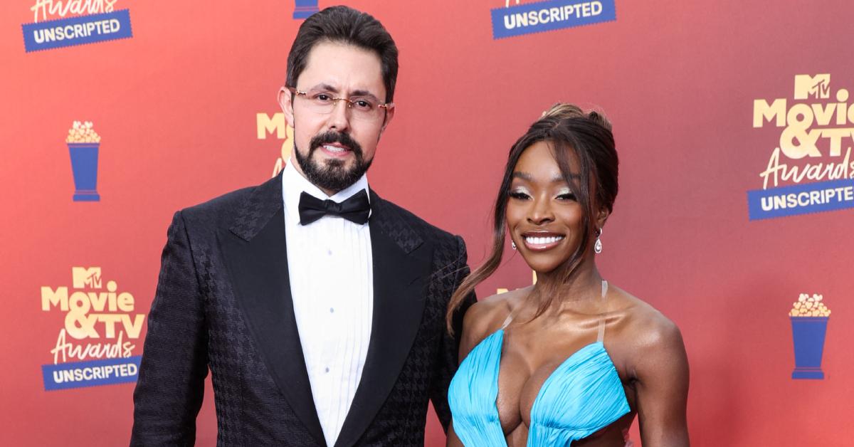 Chelsea Lazkani and her now ex-husband, Jeff Lazkani, pose on the red carpet at the 2022 MTV Movie And TV Awards.