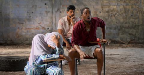 Muna looks down in disbelief, and Quaylyn's jaw drops during the bidding mission in Season 2 of 'The Mole.'