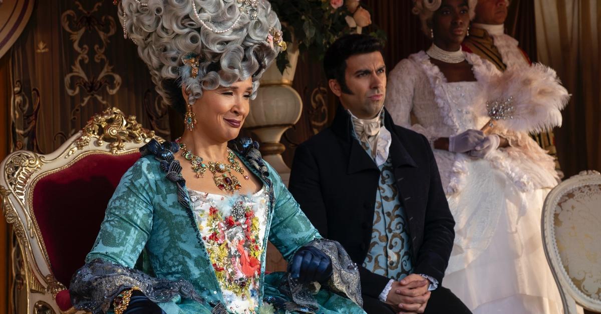 Queen Charlotte smiling at guests in Season 3 of 'Bridgerton'