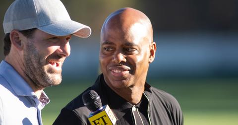 Kevin Frazier interviewing Tony Romo in 2022.