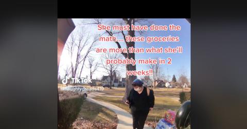 Instacart Worker Takes the Groceries After Making a Delivery